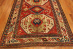 Classic Red Background Tribal Geometric Design Antique 19th Century Caucasian Kazak Rug 43276 by Nazmiyal Antique Rugs