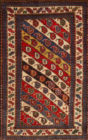 Vibrant Antique Caucasian Kazak Rug with Diagonal Paisley Motifs and Tribal Design 73171 by Nazmiyal Antique Rugs