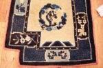 Bottom left of Pair of Antique Chinese Ningxia Pillar Rugs with Mirrored Dragon Motifs Bottom left of Pair of Antique Chinese Ningxia Pillar Rugs with Mirrored Dragon Motifs 73621 by Nazmiyal Antique Rugs