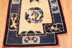 Bottom right of Pair of Antique Chinese Ningxia Pillar Rugs with Mirrored Dragon Motifs Bottom right of Pair of Antique Chinese Ningxia Pillar Rugs with Mirrored Dragon Motifs 73621 by Nazmiyal Antique Rugs