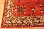Corner of Vintage Silk Khotan Rug with Auspicious Medallion and Vibrant Red Field Corner of Vintage Silk Khotan Rug with Auspicious Medallion and Vibrant Red Field 73777 by Nazmiyal Antique Rugs