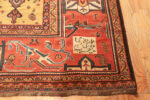 Writing of Antique Gold Background Persian Bakhtiari Rug Writing of Antique Gold Background Persian Bakhtiari Rug 43345 by Nazmiyal Antique Rugs