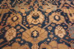 Close Up of Majestic Lion Garden: Antique Persian Bakshaish Rug in Indigo and Flame Close Up of Majestic Lion Garden: Antique Persian Bakshaish Rug in Indigo and Flame 73575 by Nazmiyal Collection