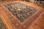 Floor View of Majestic Lion Garden: Antique Persian Bakshaish Rug in Indigo and Flame Floor View of Majestic Lion Garden: Antique Persian Bakshaish Rug in Indigo and Flame 73575 by Nazmiyal Collection