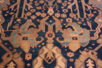 Flower Detail of Majestic Lion Garden: Antique Persian Bakshaish Rug in Indigo and Flame Flower Detail of Majestic Lion Garden: Antique Persian Bakshaish Rug in Indigo and Flame 73575 by Nazmiyal Collection