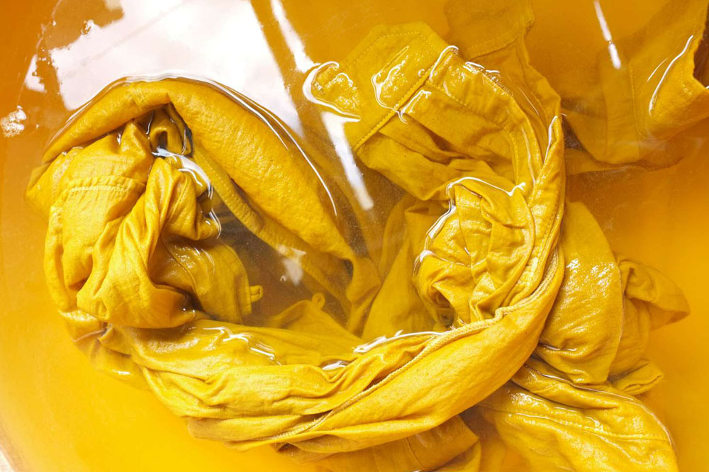 Yellow Fabric Being Dyed Blog
