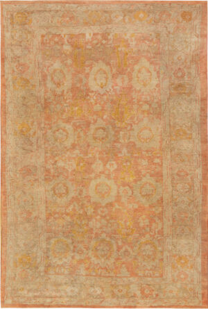 Antique Turkish Angora Oushak rug 74165 with an allover floral pattern in salmon, ivory, and soft golden tones.
