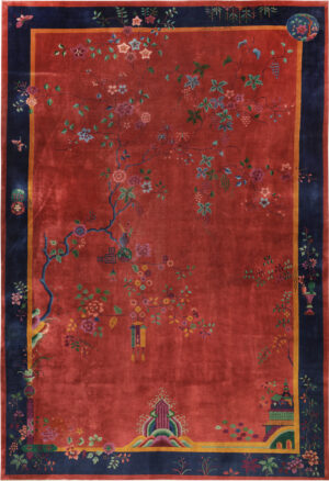 Large antique Chinese Art Deco rug 74449 with flowering branches, hanging ornaments, a red field, and a deep blue border.