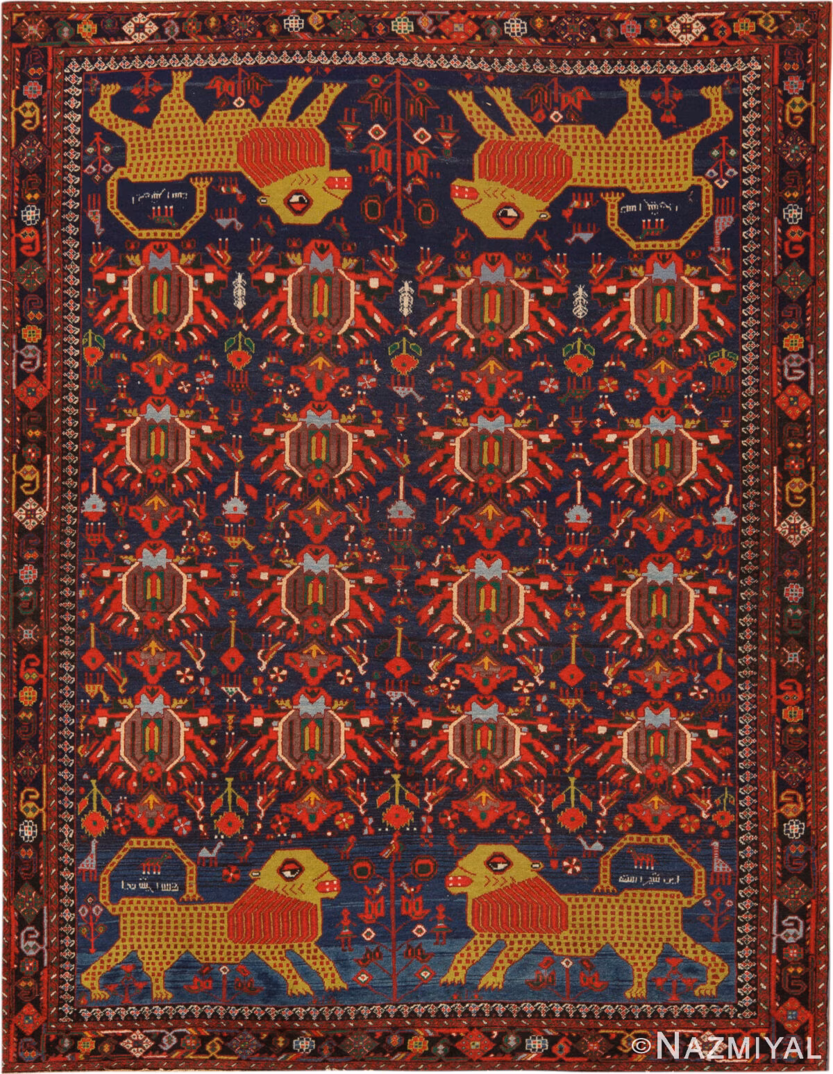Antique Persian Afshar rug 74517 with four golden lions, red floral palmettes, and geometric borders on a deep blue ground.
