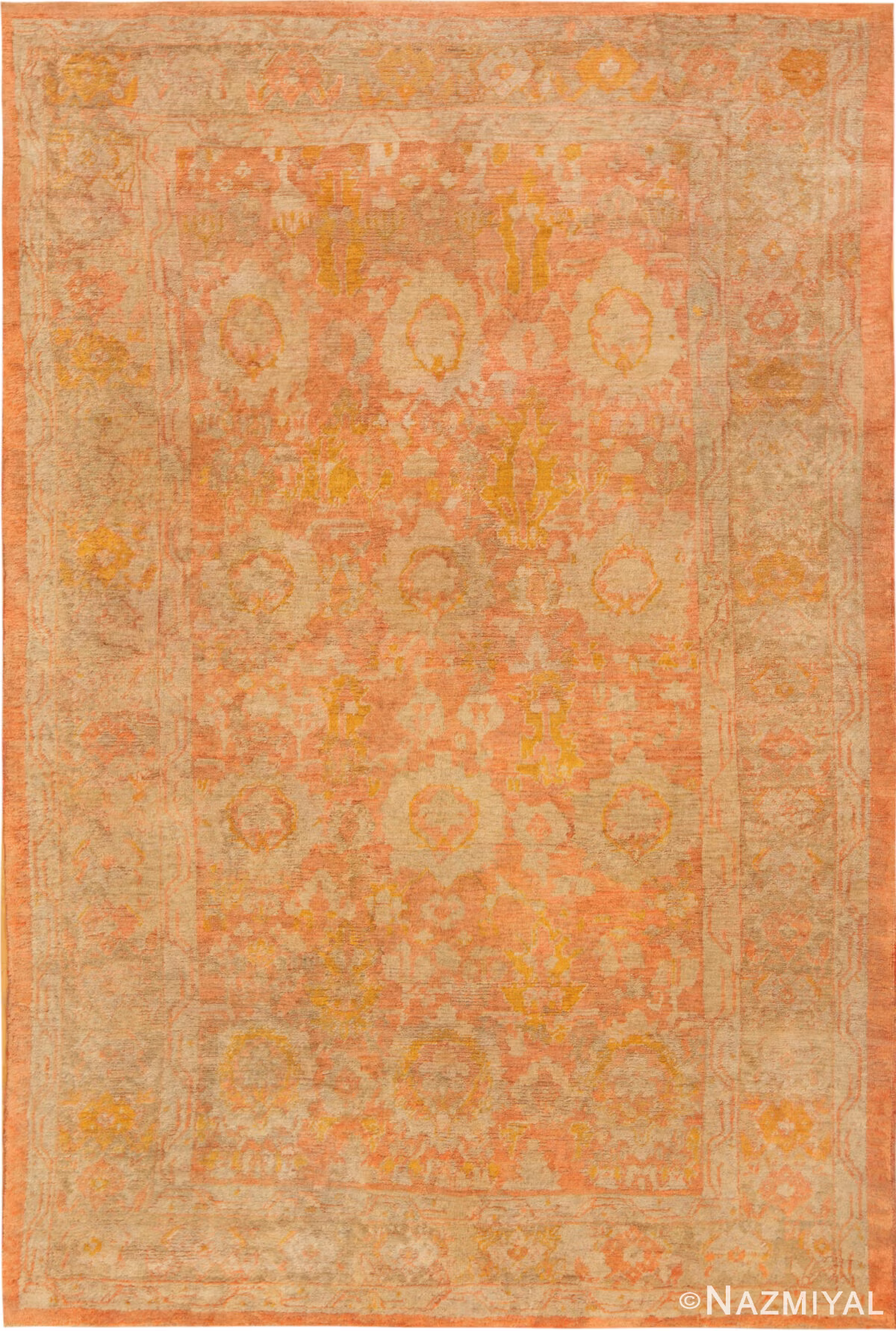 Antique Turkish Angora Oushak rug 74165 with an allover floral pattern in salmon, ivory, and soft golden tones.